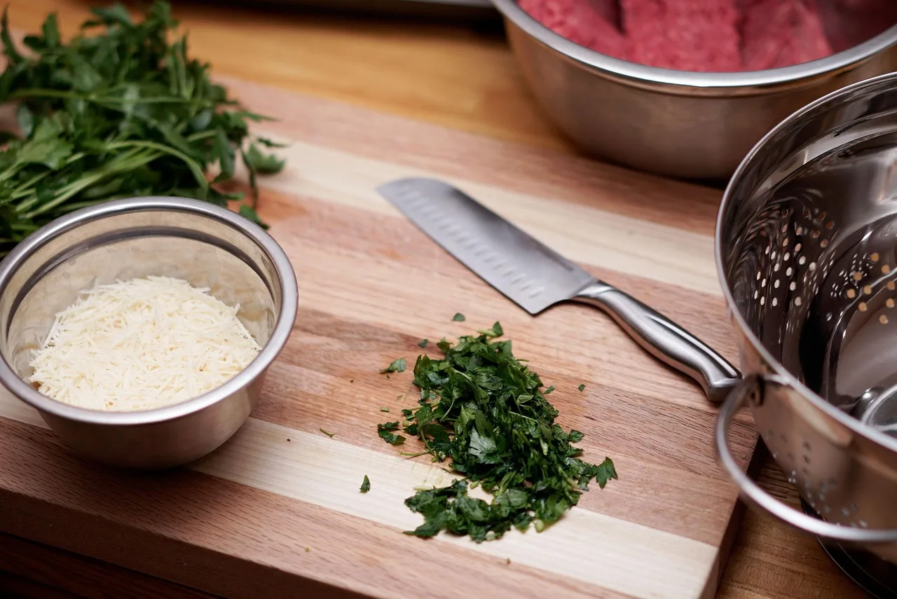 kitchen, cooking, knife, cilantro, mixing bowl, strainer bowl, strainer, kitchenware, parmesan, shredded cheese, shredded parmesan, cutting board, wood cutting board, kitchen, kitchen, kitchen, kitchen, cooking, cooking, cooking, cooking, cooking,…