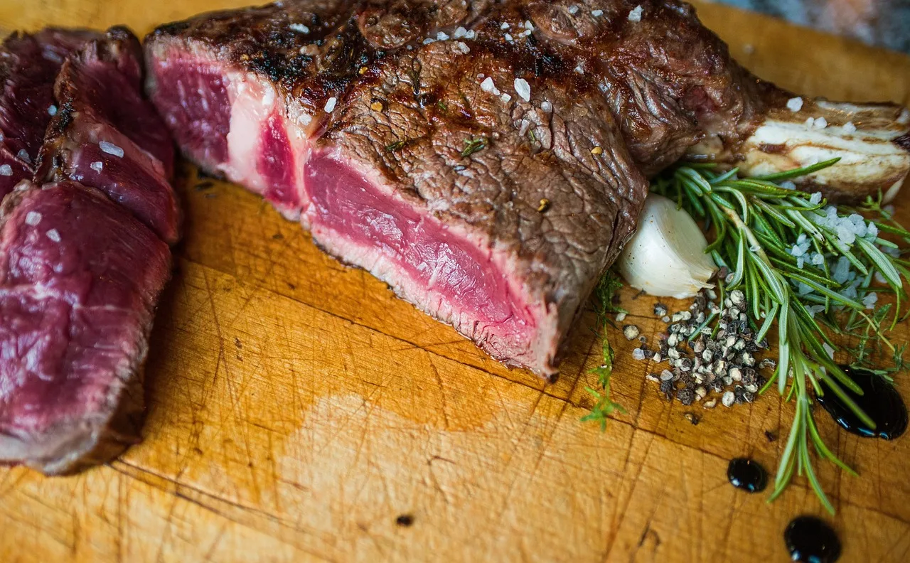 meat, steak, beef, rare steak, rare, kitchen, chopping board, wooden board, rosemary, garlic, salt, pepper, main course, entree, eat, food, steak, rare steak, rare steak, rare steak, rare steak, rare steak, entree